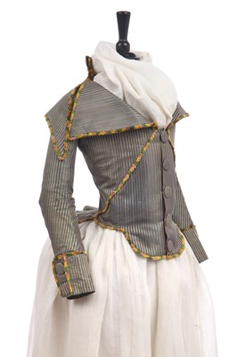 Lot 297 - A fine and rare striped silk caraco à la 'Pierrot' jacket, embroidered 'petticoat' and fichu, circa 1790