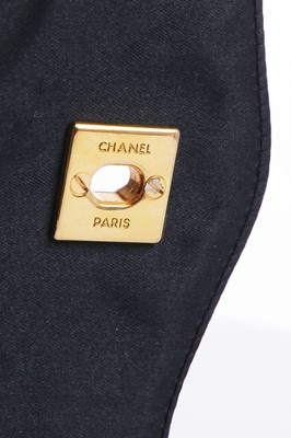 Lot 9 - A Chanel quilted black satin evening bag, 1994-96