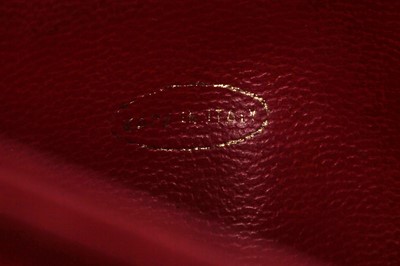 Lot 3 - A Chanel quilted red lambskin leather Chandra bag, 1980s