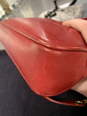 Lot 3 - A Chanel quilted red lambskin leather Chandra bag, 1980s