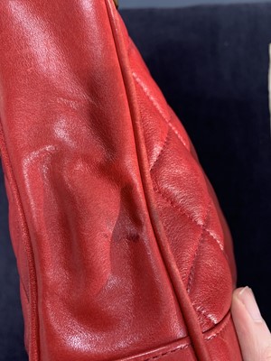 Lot 3 - A Chanel quilted red lambskin leather Chandra bag, 1980s