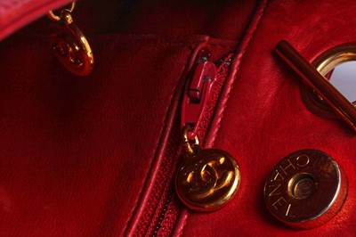 Lot 3 - A Chanel quilted red lambskin leather Chandra bag, 1980s