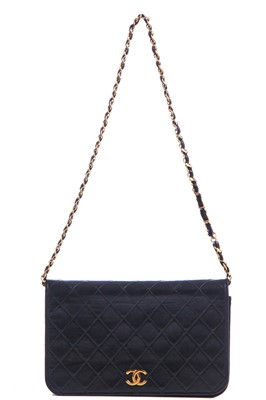 Lot 11 - A Chanel quilted black leather flap bag, probably mid-1990s