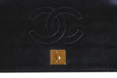 Lot 11 - A Chanel quilted black leather flap bag, probably mid-1990s