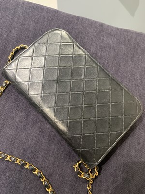 Lot 11 - A Chanel quilted black leather flap bag, probably mid-1990s