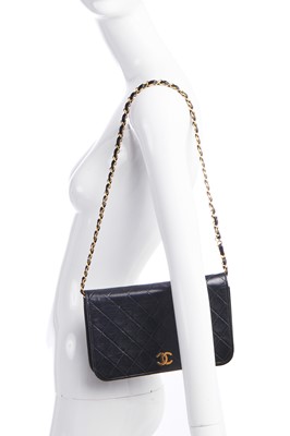 Lot 11 - A Chanel quilted black leather flap bag, probably mid-1990s