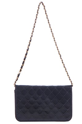 Lot 11 - A Chanel quilted black leather flap bag, probably mid-1990s