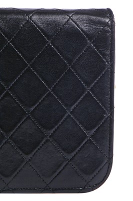 Lot 11 - A Chanel quilted black leather flap bag, probably mid-1990s