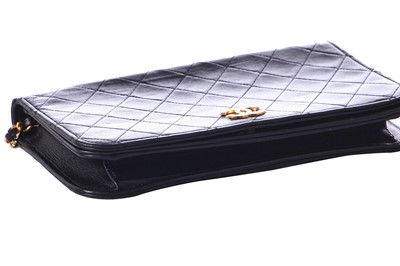 Lot 11 - A Chanel quilted black leather flap bag, probably mid-1990s