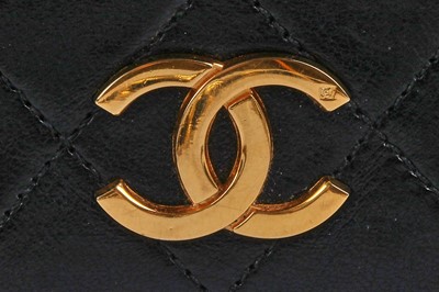 Lot 11 - A Chanel quilted black leather flap bag, probably mid-1990s