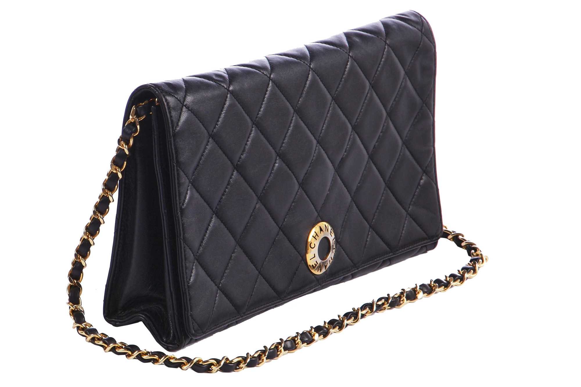Lot 7 - A Chanel quilted black leather flap bag, 1980s