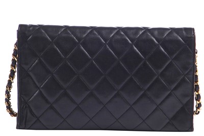 Lot 7 - A Chanel quilted black leather flap bag, 1980s