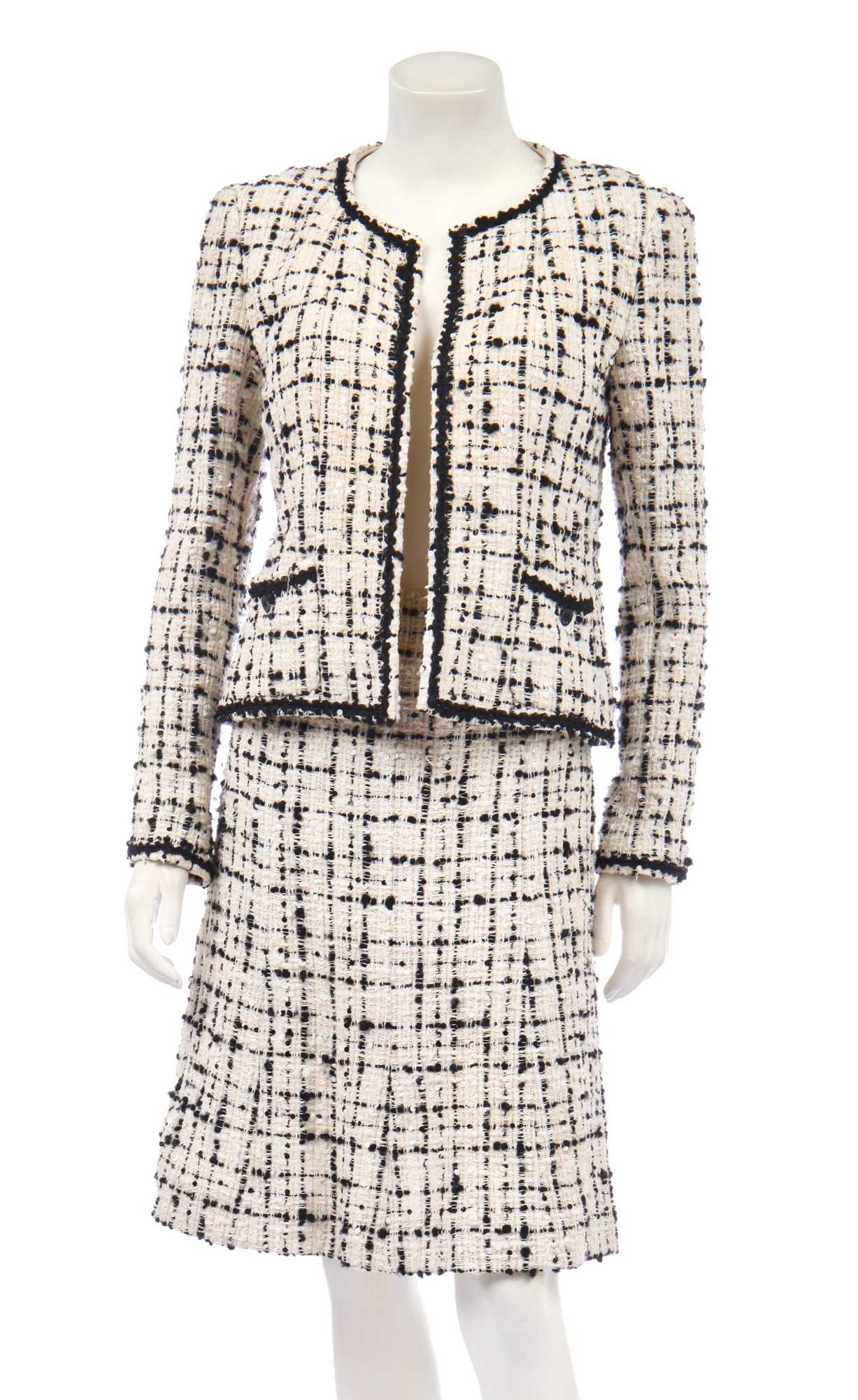 Lot 10 - A Chanel bouclé tweed suit, Cruise collection 2003