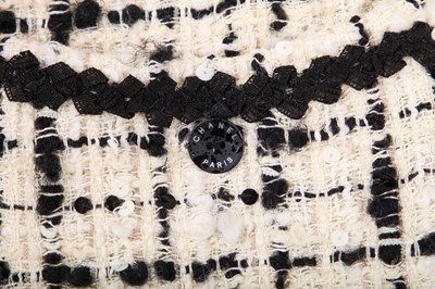 Lot 10 - A Chanel bouclé tweed suit, Cruise collection 2003
