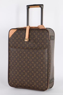 Lot 81 - A Louis Vuitton monogrammed leather suitcase,...