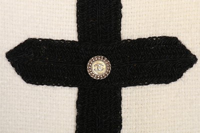 Lot 11 - A Chanel cream and black wool dress, 2005,...