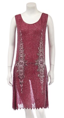 Lot 454 - A rose-pink beaded muslin flapper dress, circa 1925