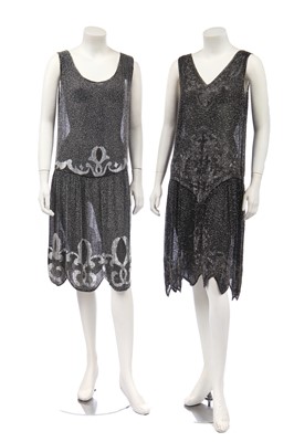 Lot 457 - Two beaded black muslin flapper dresses, circa 1925