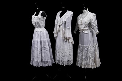 Lot 493 - A group of white cotton blouses and lingerie, 1900-1910s