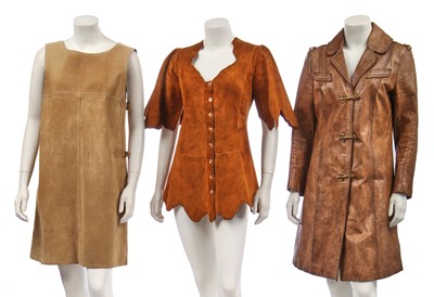Lot 329 - A Cordoba buff leather coat with brass 'key' fastenings, late 1960s