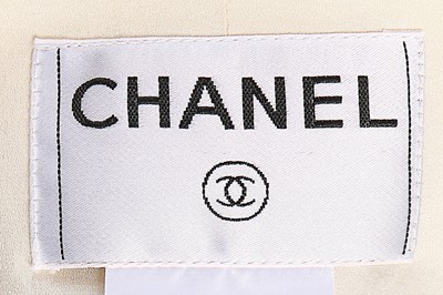 Lot 13 - A Chanel wool suit, 2000, labelled and size 40,...