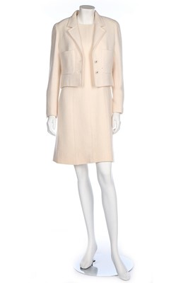 Lot 14 - A Chanel cream wool dress and matching jacket,...