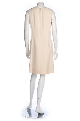 Lot 14 - A Chanel cream wool dress and matching jacket,...