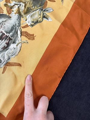 Lot 50 - Three Hermès printed silk scarves, various dates