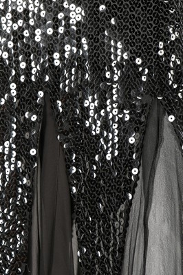 Lot 141 - A Loris Azzaro black sequinned evening gown,...