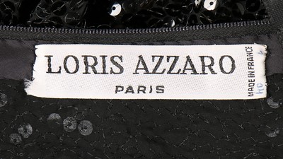 Lot 141 - A Loris Azzaro black sequinned evening gown,...