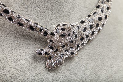 Lot 63 - Two Butler & Wilson rhinestone encrusted cuff bracelets, 1980s