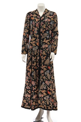 Lot 440 - An Indian embroidered black wool coat, 1930s