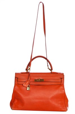 Lot 186 - A Hermès orange Swift leather Retournè Kelly 35, 1995