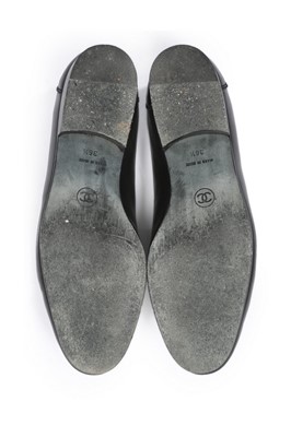 Lot 18 - Three pairs of Chanel shoes, modern, stamped...