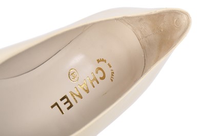 Lot 18 - Three pairs of Chanel shoes, modern, stamped...