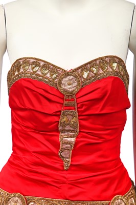 Lot 25 - A red satin cocktail dress in the style of Chanel, probably late 1980s