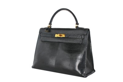 Lot 233 - An Hermès midnight-blue Niloticus lizard...