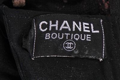 Lot 181 - A Chanel little black dress with polka-dot pink faille cummerbund, Spring-Summer 1988