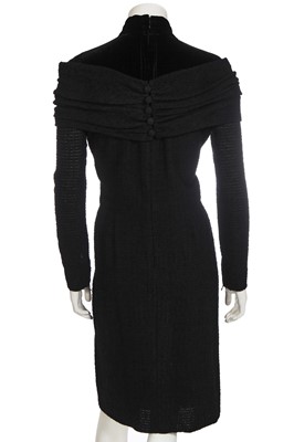 Lot 382 - A Pierre Balmain couture black bouclé wool dress, late 1950s-early 1960s