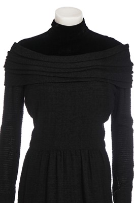 Lot 382 - A Pierre Balmain couture black bouclé wool dress, late 1950s-early 1960s