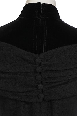 Lot 382 - A Pierre Balmain couture black bouclé wool dress, late 1950s-early 1960s