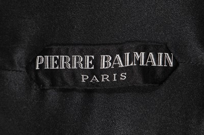 Lot 382 - A Pierre Balmain couture black bouclé wool dress, late 1950s-early 1960s