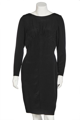 Lot 205 - An Yves Saint Laurent couture black silk crêpe dress, circa 1984