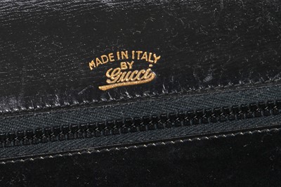 Lot 43 - A Gucci black crocodile handbag, 1960s