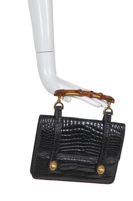 Lot 43 - A Gucci black crocodile handbag, 1960s