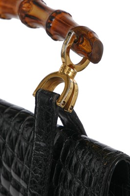 Lot 43 - A Gucci black crocodile handbag, 1960s