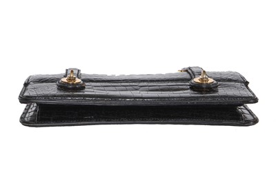 Lot 43 - A Gucci black crocodile handbag, 1960s