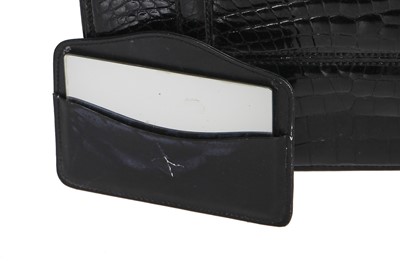 Lot 43 - A Gucci black crocodile handbag, 1960s