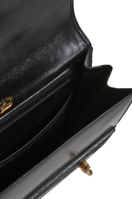 Lot 43 - A Gucci black crocodile handbag, 1960s