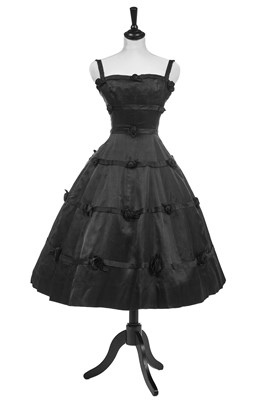 Lot 256 - A Christian Dior couture black satin cocktail dress, Spring-Summer 1956